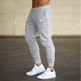 2019 New Men Joggers Brand Male Trousers Casual Pants Sweatpants Jogger grey Casual Elastic cotton GYMS Fitness Workout pan