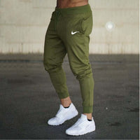 2019 New Men Joggers Brand Male Trousers Casual Pants Sweatpants Jogger grey Casual Elastic cotton GYMS Fitness Workout pan